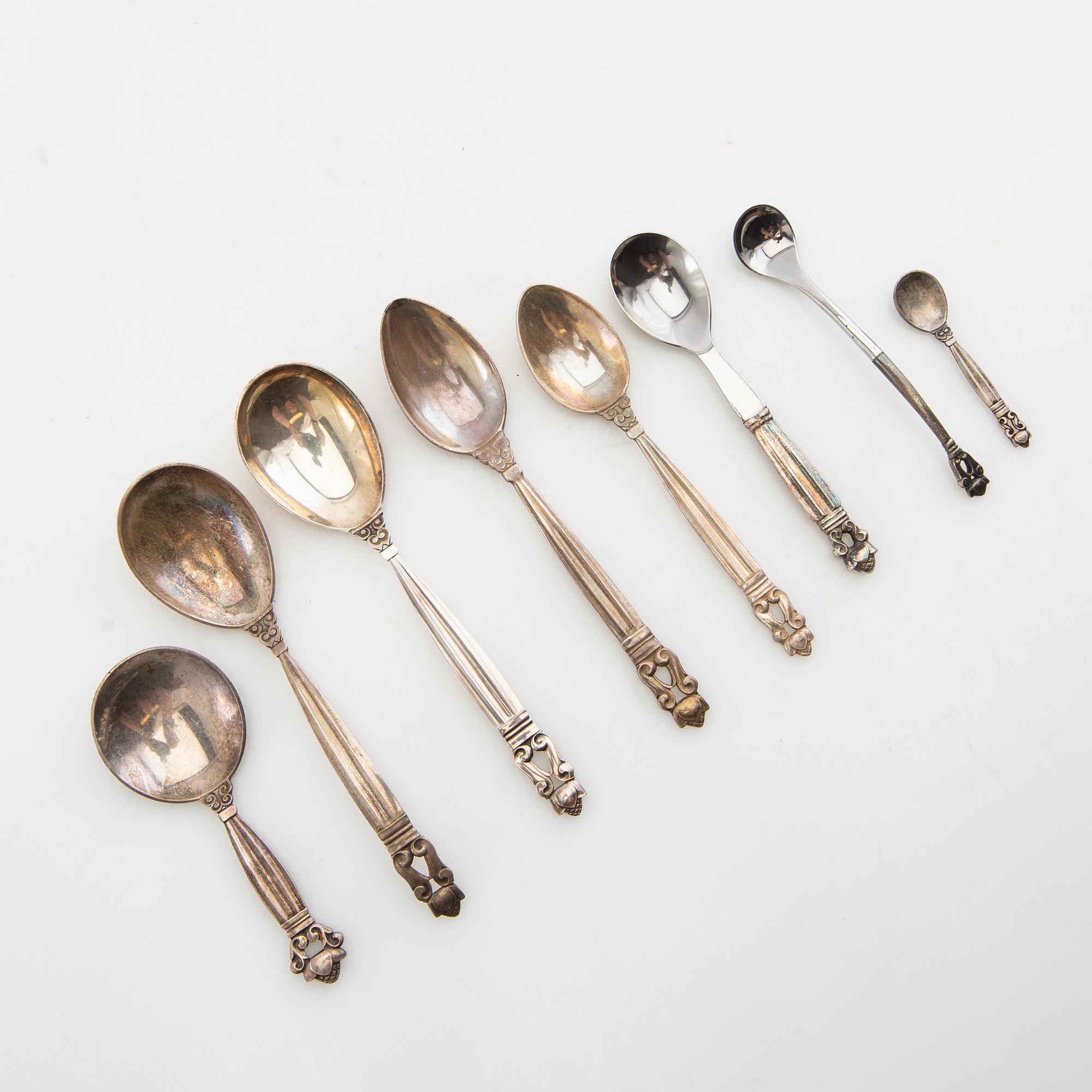 Johan Rohde, serveringsskedar 13 st "Konge/Achorn" sterlingsilver för Georg Jensen efter 1945.