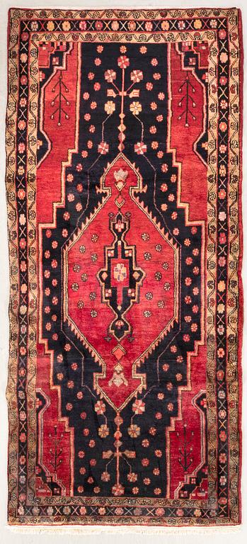 An old Nahavand carpet approx 340x150 cm.