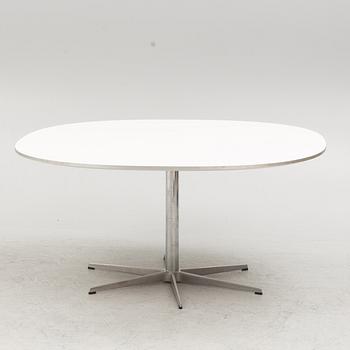 Arne Jacobsen, Bruno Mathsson & Piet Hein, a 'Super circle' dining table, Fritz Hansen, Denmark, 2007.