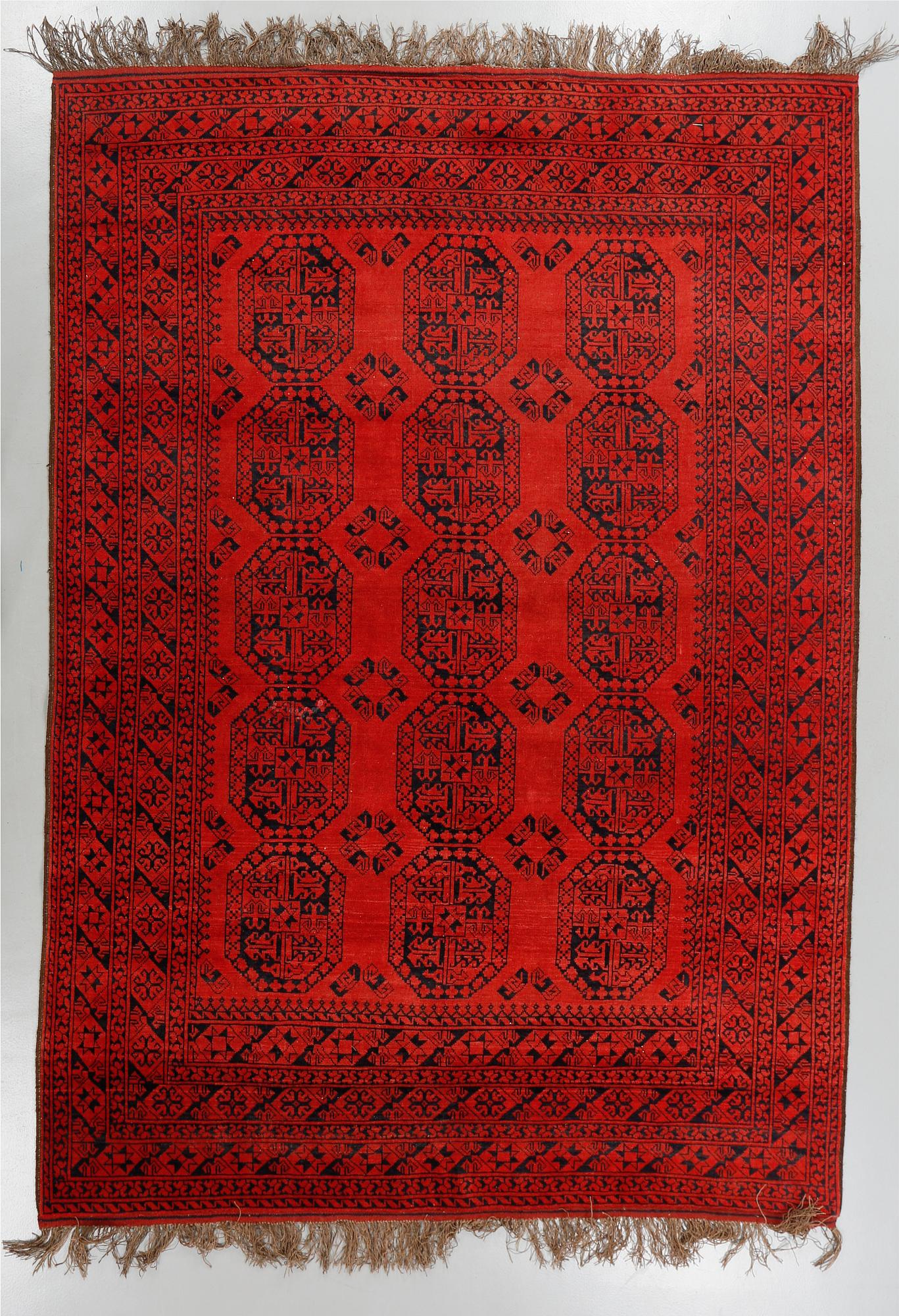 An Afghan rug, old/semi antique, 288 x 212 cm.