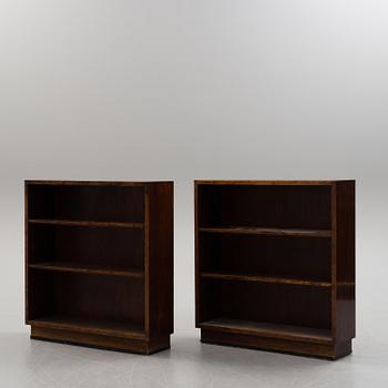 A pair of 1930's birch art deco bookcases.