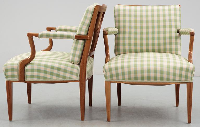 A pair of Josef Frank arm chairs by Firma Svenskt Tenn.