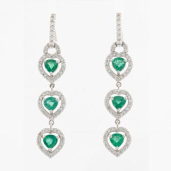 Emerald and brilliant cut diamond earrings.