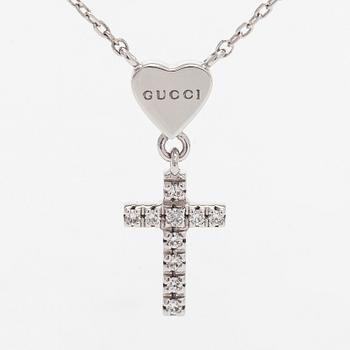 Gucci, an 18K white gold necklace with diamonds.