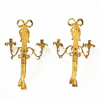 A pair of gilt bronze two-branch appliques after F. L. Rung, late 19th century,
