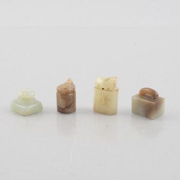 A group of four Chinese stone seals, 20th century.