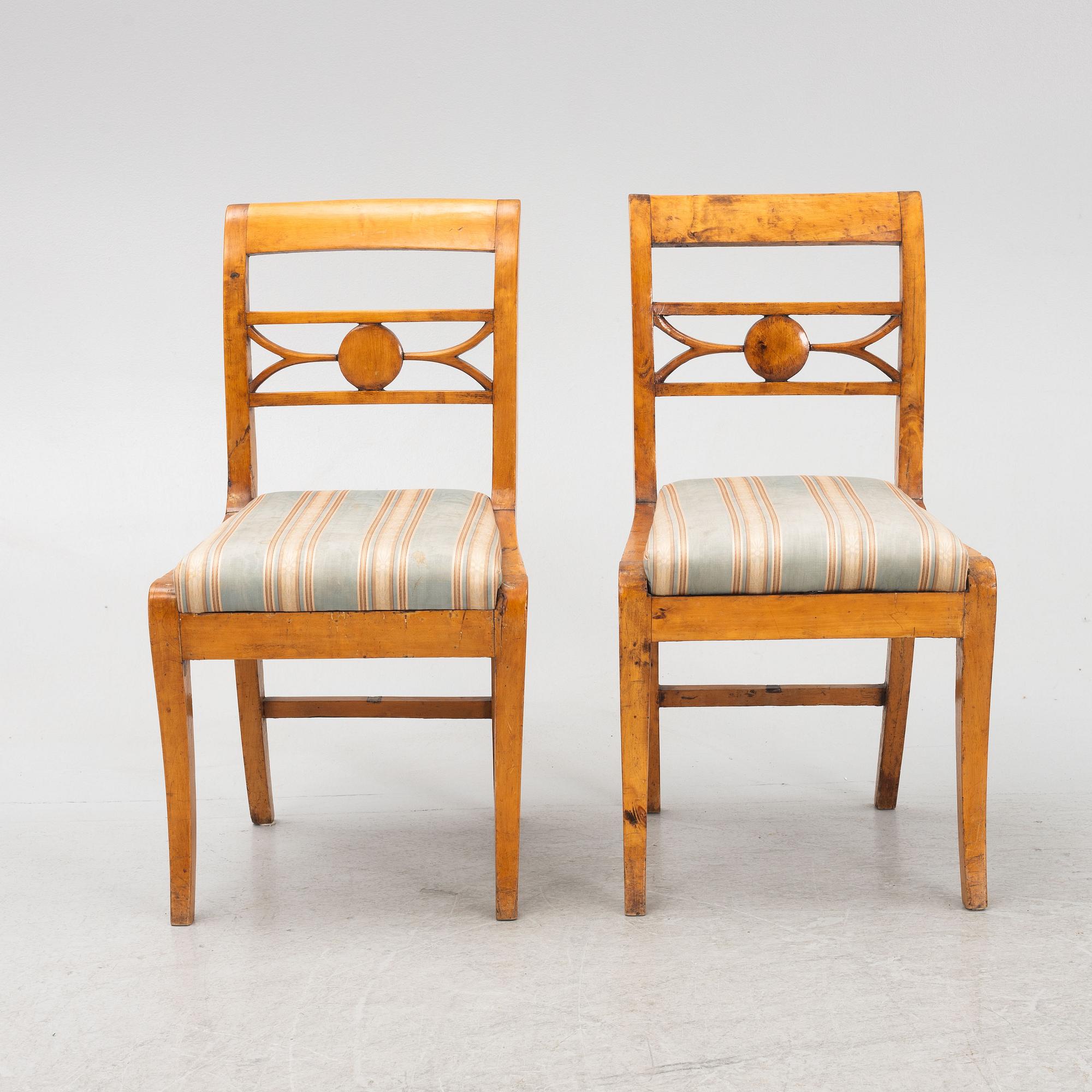 Drop-leaf table and two chairs, Empire style, first half of the 19th century.