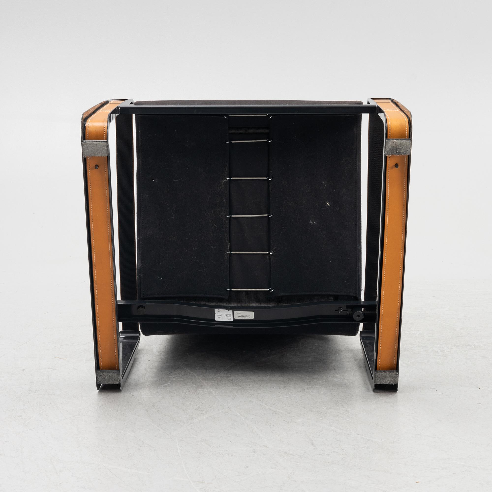 Jean Prouvé, a 'Cité' easy chair, Vitra, 2012.