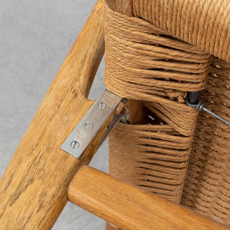 A 'CH-25' armchair designed by Hans J Wegner for Carl Hansen & Søn, Denmark.