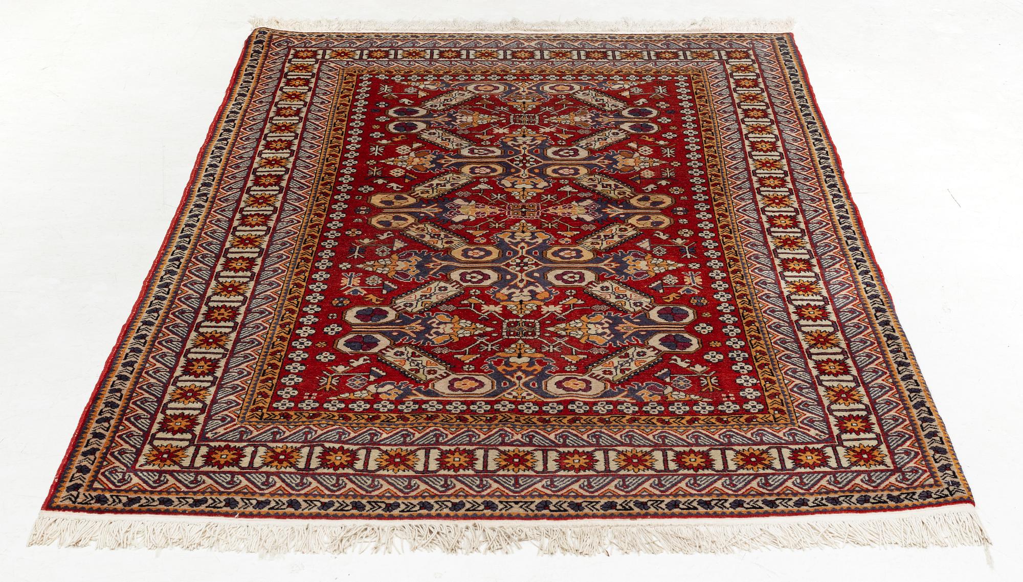 A rug, 215 x 130 cm.
