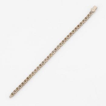 Armband 14K vitguld med runda briljantslipade diamanter.