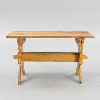 A pianted trestle table, 19th Century.