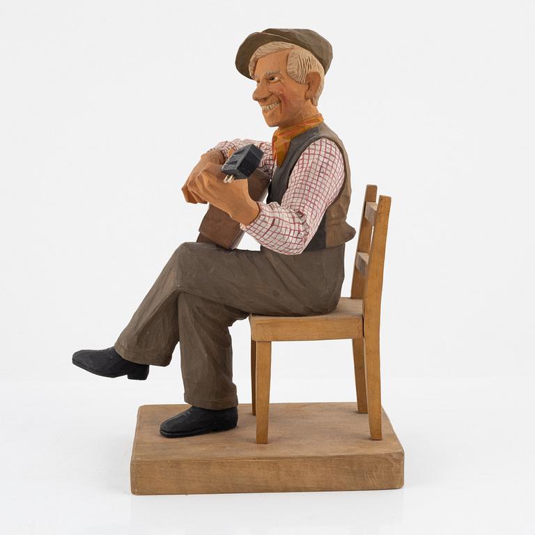 Herman Rosell, a carved and painted wood sculpture, signed Rosell and dated 1950.