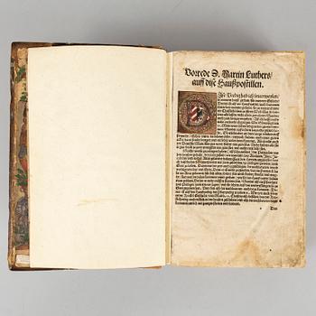 Martin Luther’s Haußpostil, 1553, with numerous coloured woodcuts.