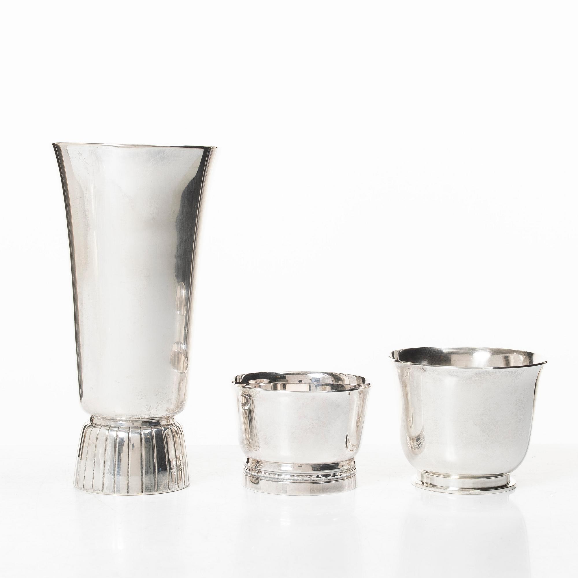 A silver vase and two bowls, Jacob Ängman, Eric Löfman, and Borgila respectively.