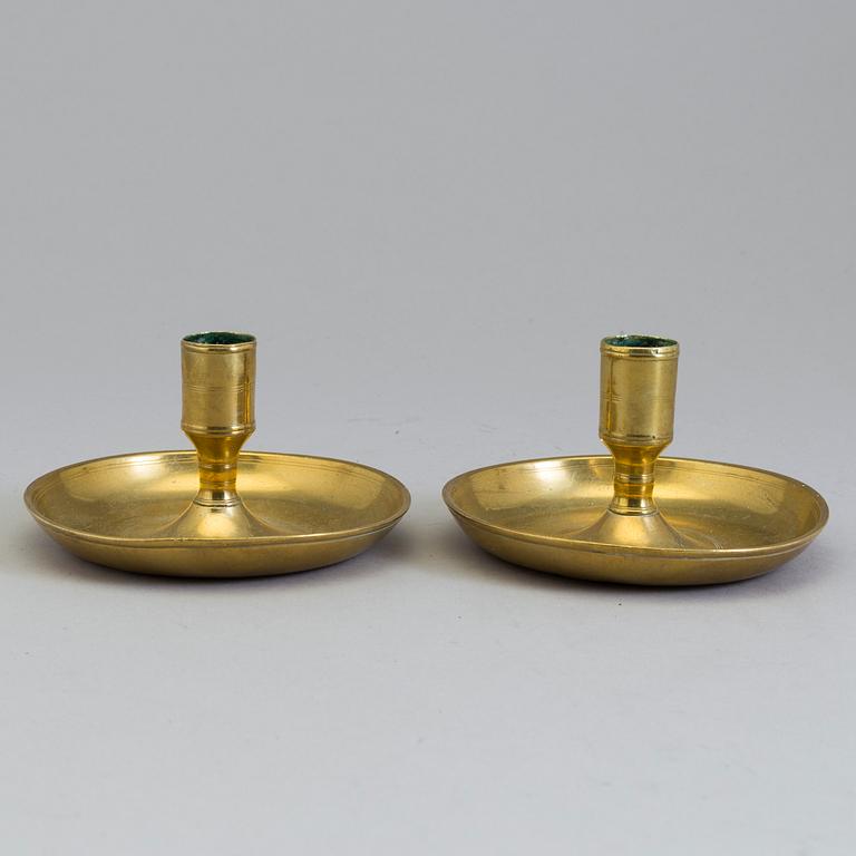 A pair of Swedish 18th century travelling brass candlesticks.