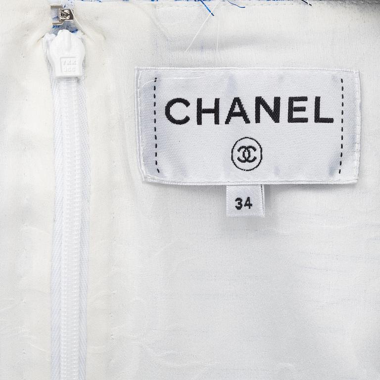 Chanel, dress, a white and blue metallic dress, size 34.