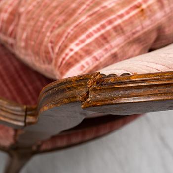 A pair of 19th-century rococo revival arm-chairs.