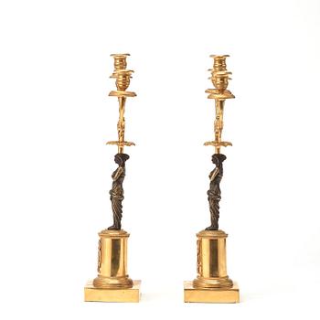 A pair of late Gustavian circa 1800 three-light candelabra.