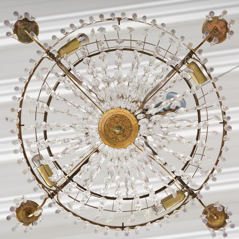 A late-Gustavian five-light gilt brass and cut glass chandelier, Stockholm, circa 1800.