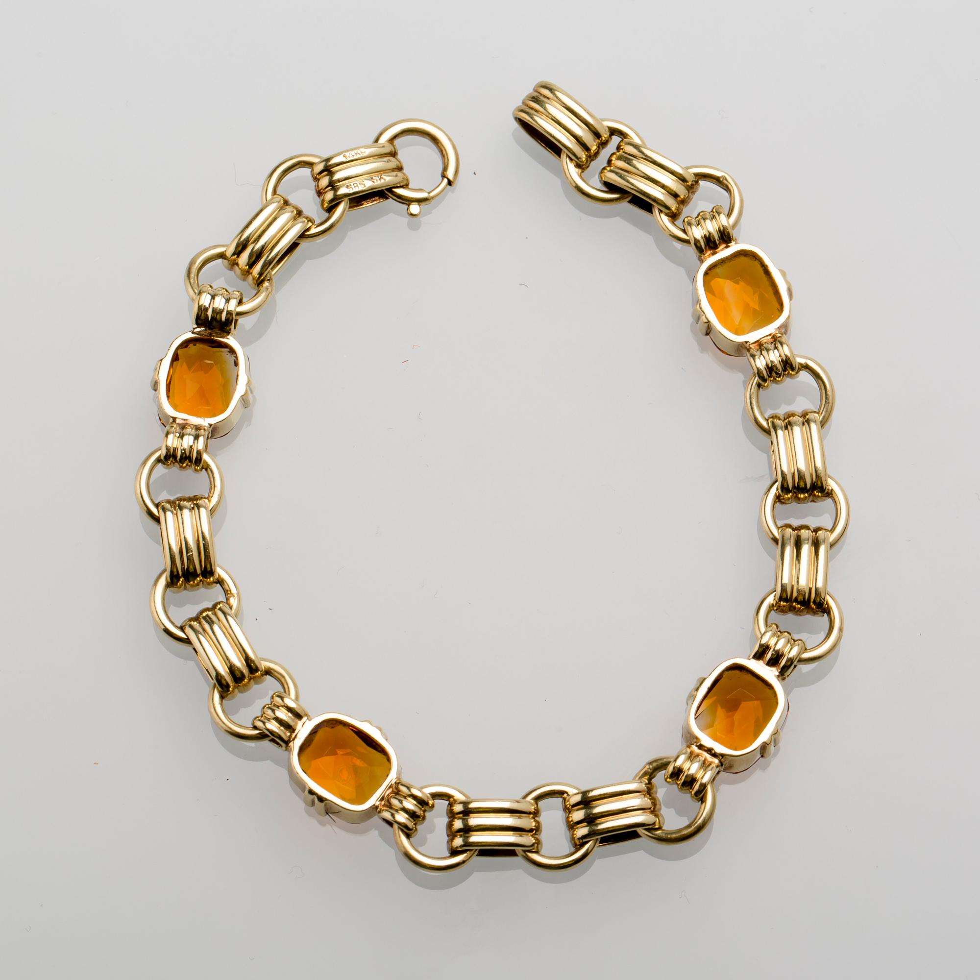 ARMBAND, 14 K guld med citriner, ca 9.00 ct. Vikt ca 16 g.