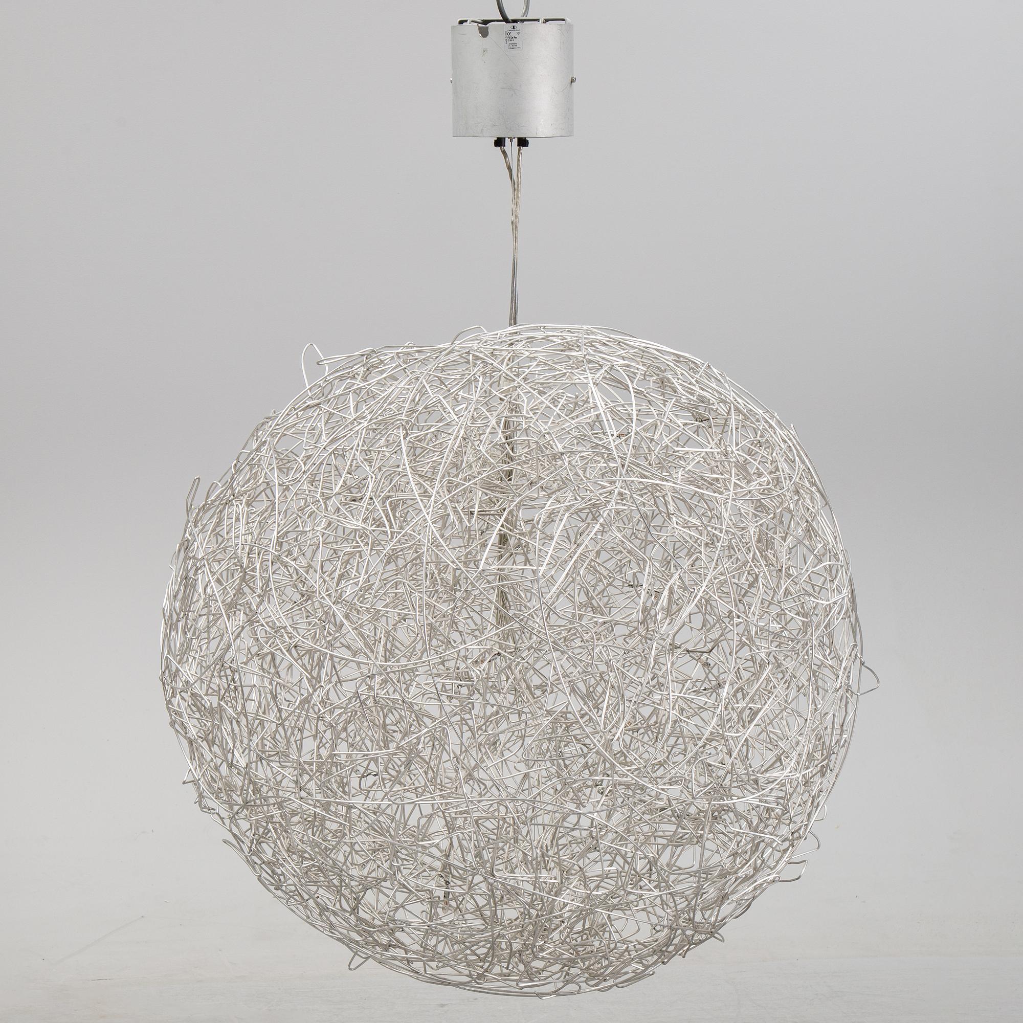 A 'Fil de Fer Ovale' ceiling light by Enzo Cattelini.