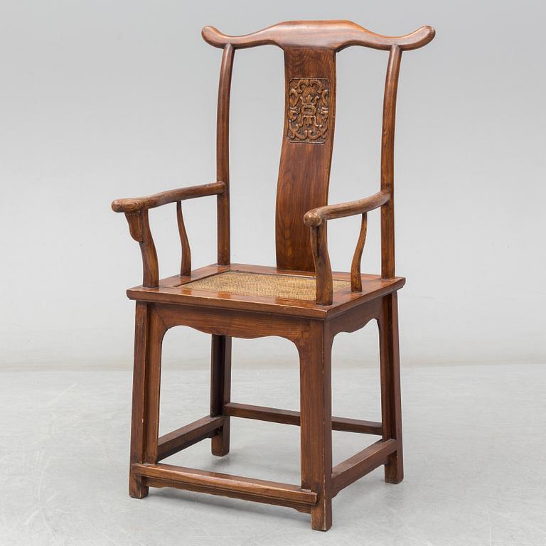 A Chinese wooden armchair, 20th century.
