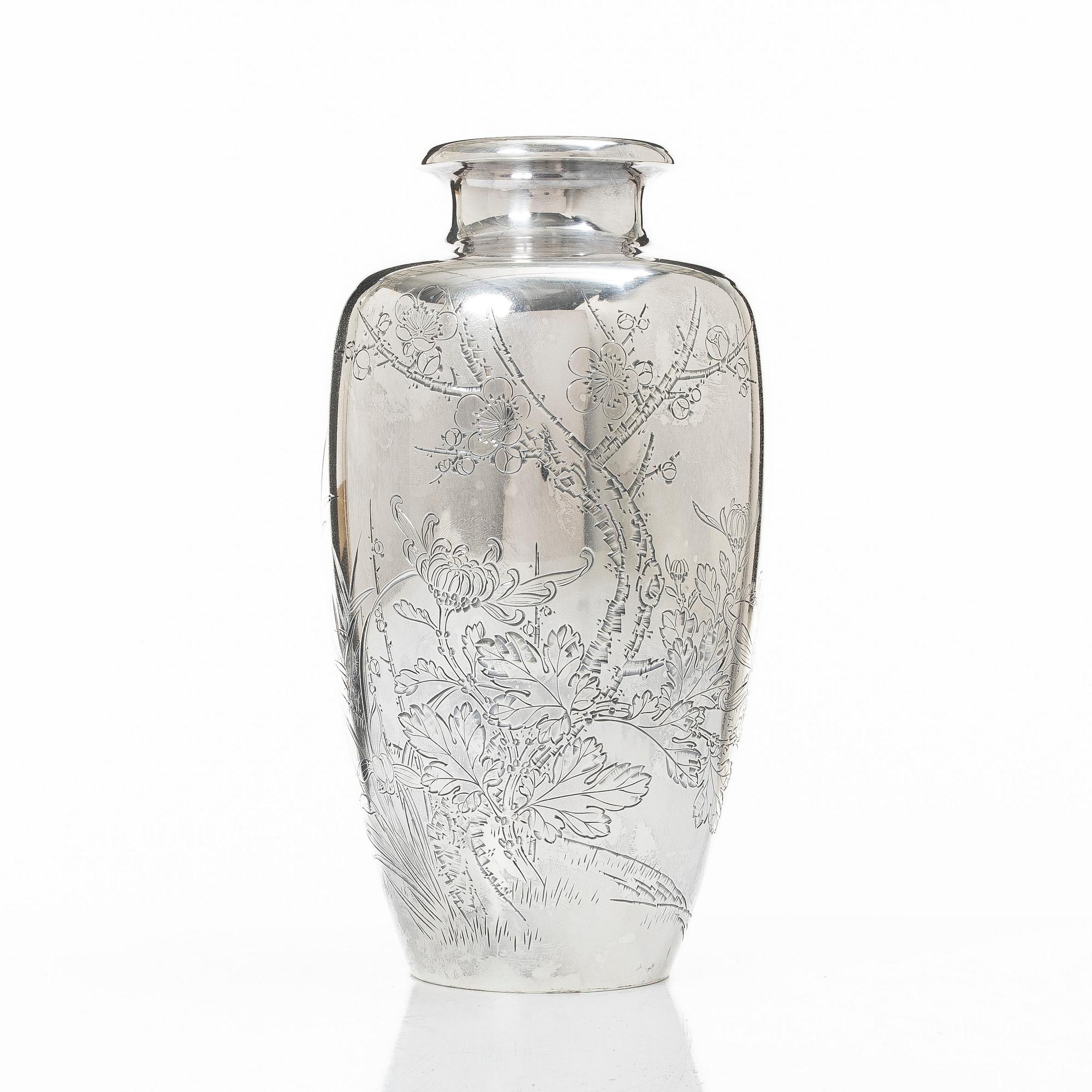 A silver vase, Japan, Meiji (1862-1912) or Tiasho (1912-1926).