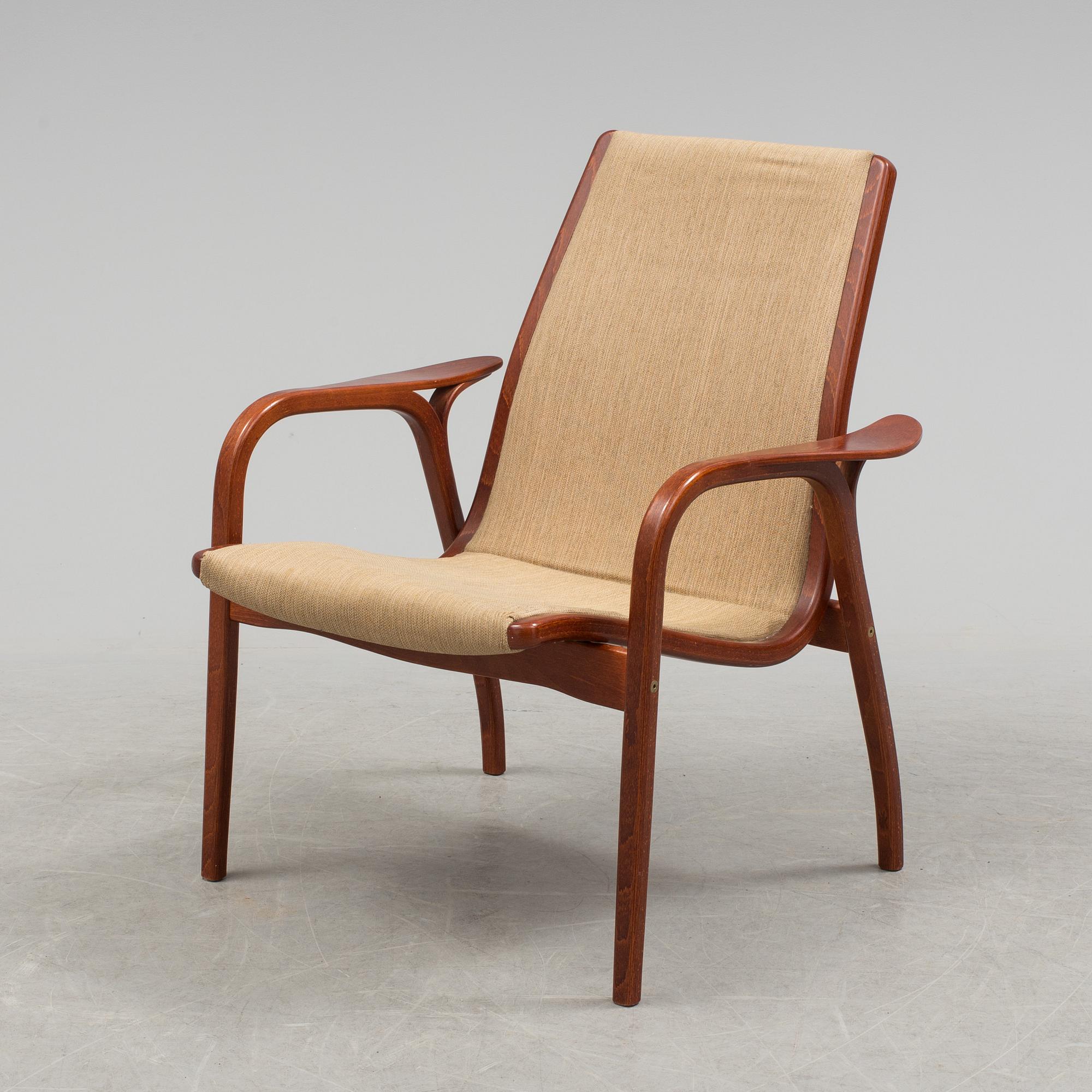 YNGVE EKSTRÖM, a "Kurva" armchair by Swedese.