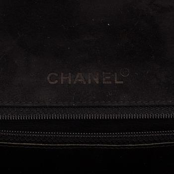 A CHOCO BAR SUEDE FLAP BAG BY CHANEL.