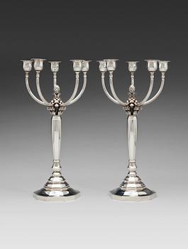 552. A pair of Johan Rohde sterling candelabra, Georg Jensen, Copenhagen, Jensen & Wendel 1945-51. Design nr 474.