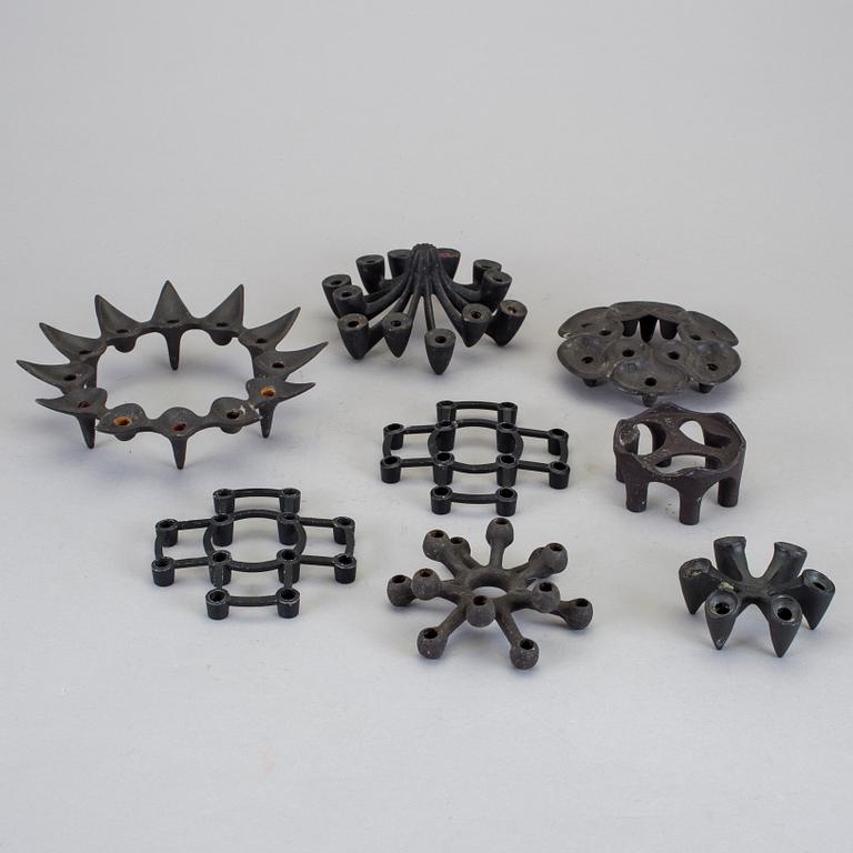 LJUSSTAKAR, 8 st, gjutjärn, design, Danmark, varav 3 st Jens Harald Qvistgaard, slutet av 1900-talet.