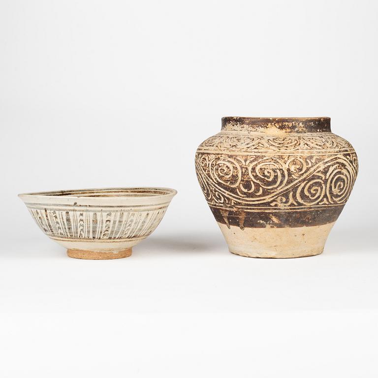 A brown glazed jar and bowl, Sawankhalok, Thailand, 14th/17th Century.