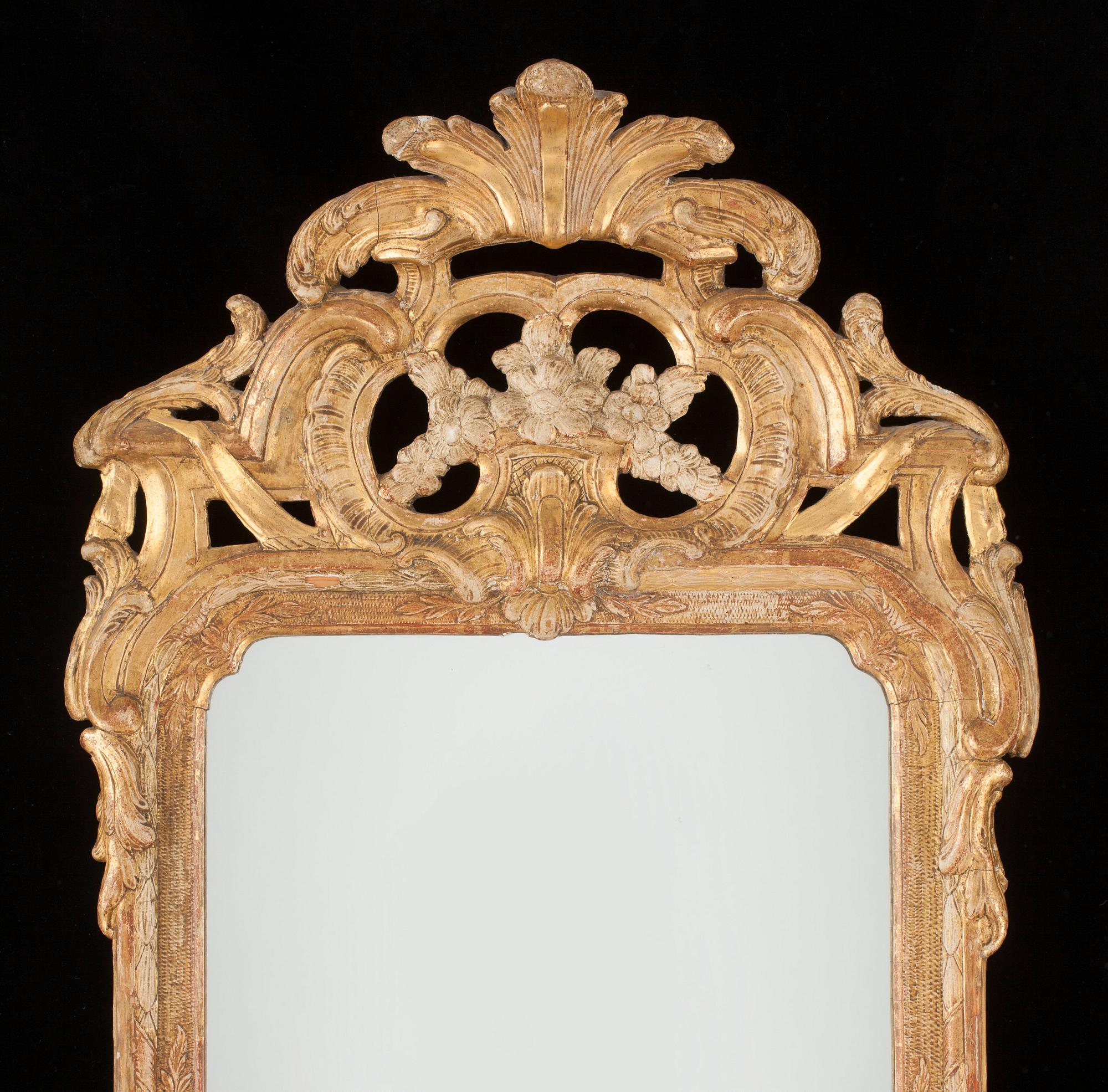 A Swedish Rococo 18th century mirror by J Åkerblad, master 1758.