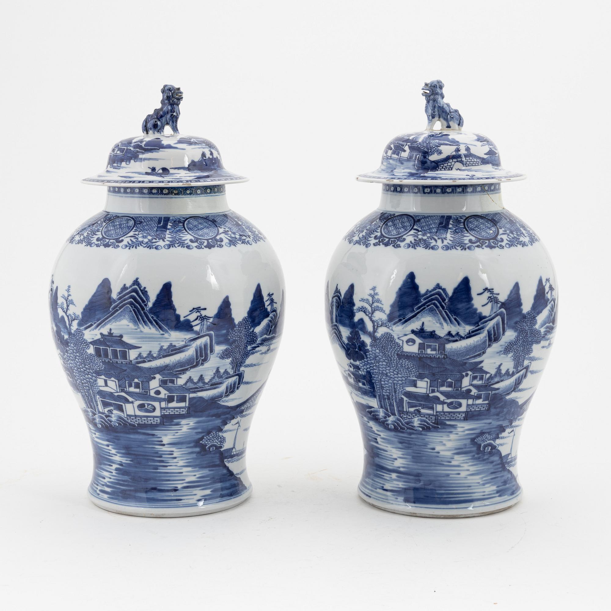 A pair of blue and white Chinese porcelain jars with covers. Qing dynasty, Qianlong (1736-95).
