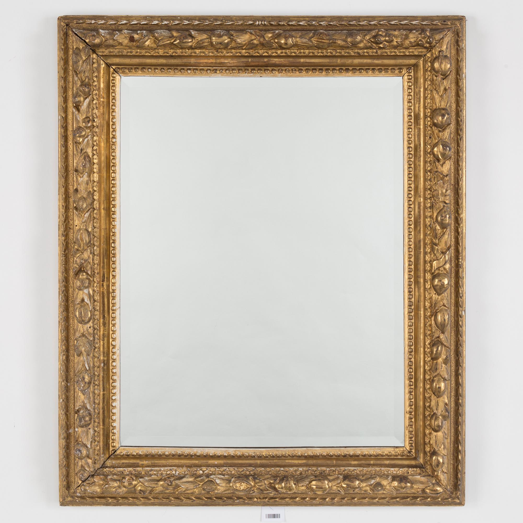 A Baroque style mirror, 19th Century.