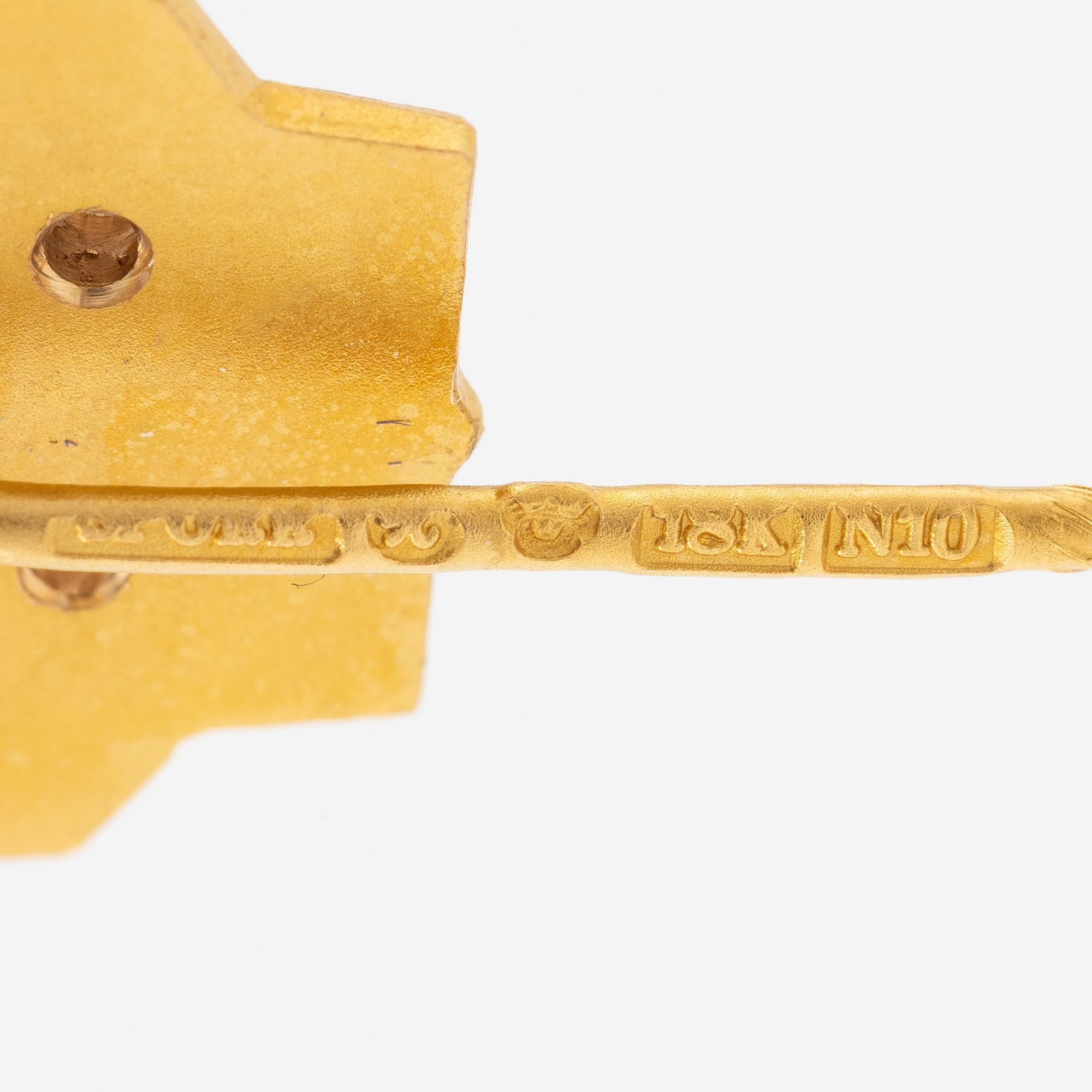 Slipsnålar, Sporrong,  ett par 18K guld med diamanter och grön sten.