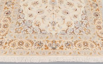 A rug Nain, Part Silk, S.K 9LAA, ca 245 x 160 cm.