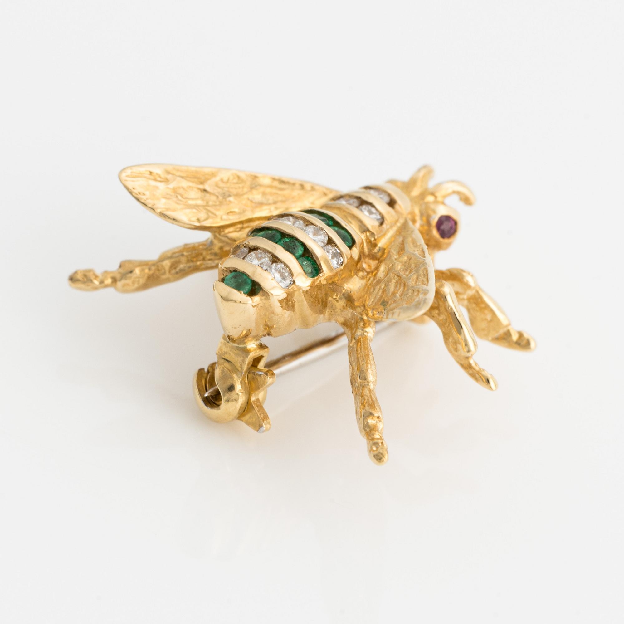 Brooch, in the shape of an insect, gold with emeralds and brilliant-cut diamonds.
