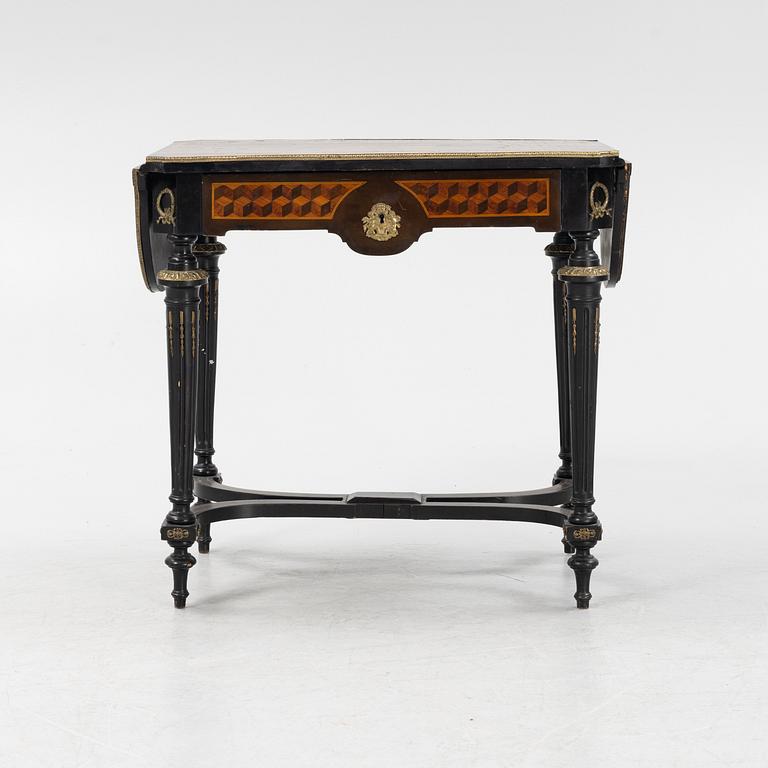 A Louis XVI style table, second half of the 19th century.