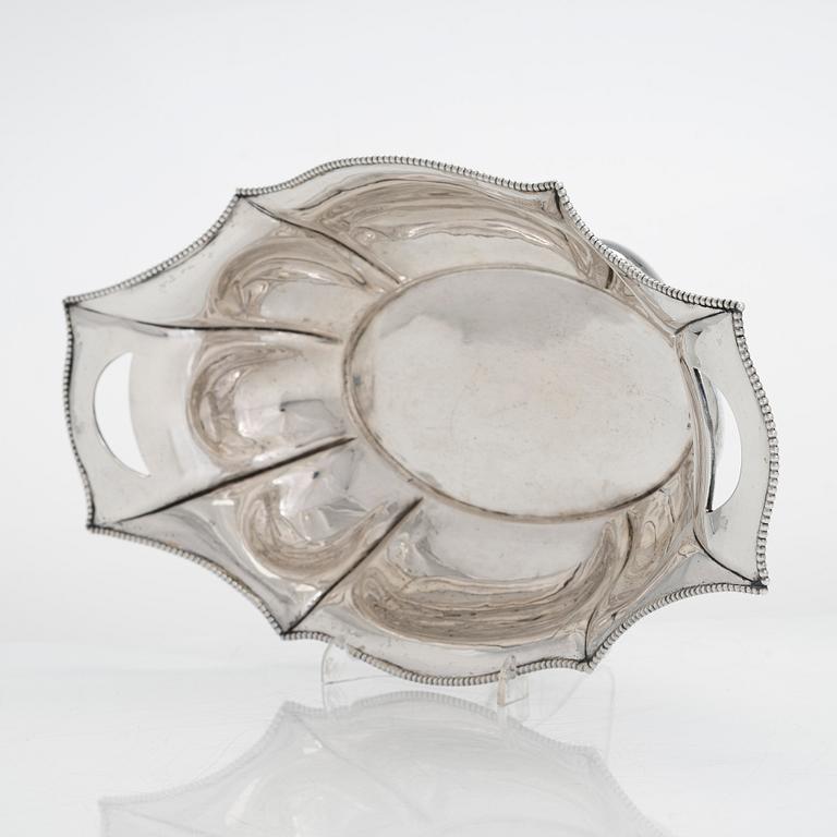 An early 20th-century silver bread basket, maker's mark of Hjalmar Fagerros, Helsinki 1911.