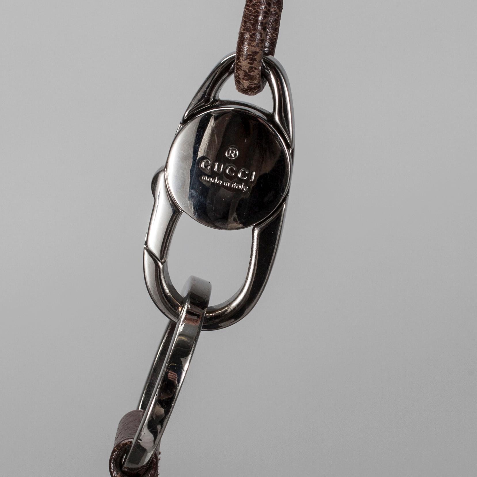 VÄSKA samt SKÄRP, Gucci.