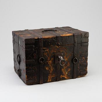 A wooden box, dated 1743.