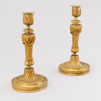 A pair of 19th century brass candlesticks, probably France.