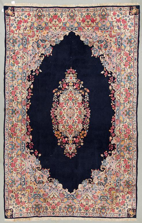 A CARPET. Old Kerman. Around 283 x 180 cm.