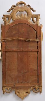 A Trasitional giltwood mirror by J. Åkerblad (master in Stockholm 1758-99).