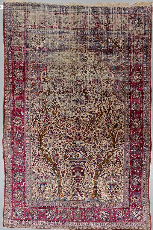 A semi-antique silk Kashan, ca 316 x 205.