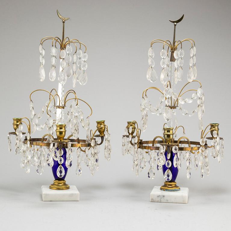 A pair of Gustavian style cut glass candlesticks, circa 1900.