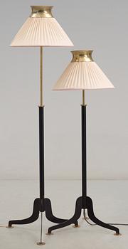 A pair of Josef Frank iron and brass floor lamps by Svenskt Tenn.