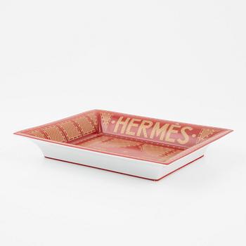 Hermès, a 'Sellier' porcelain change tray.